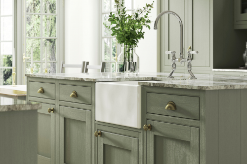 Atlantic Green New ENgland kitchen with brass handles and brass tap shown with a marble worktop